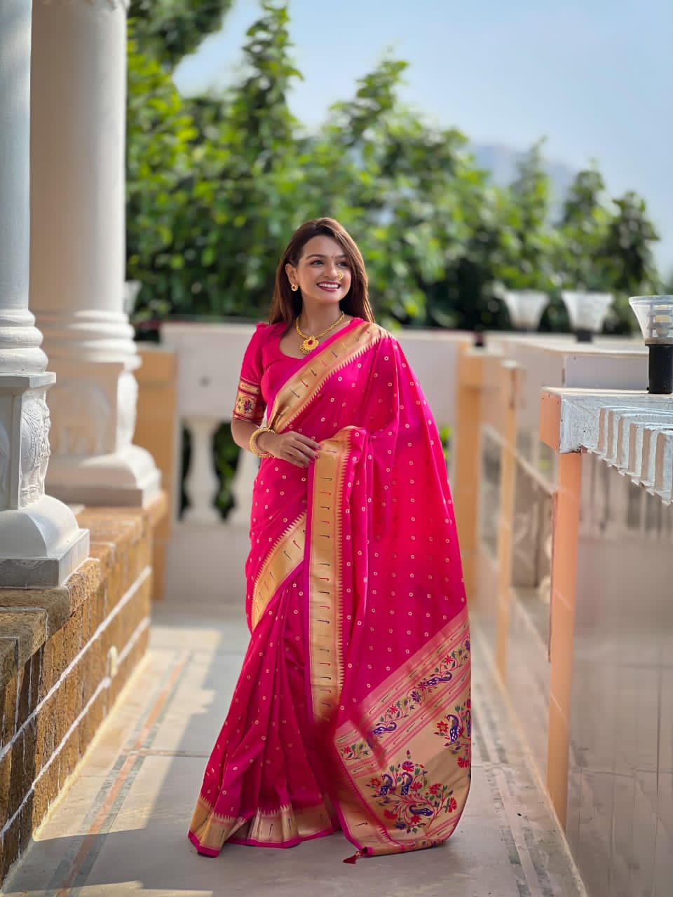 Soft Paithani Silk Saree with Zari Bindi Weaving.